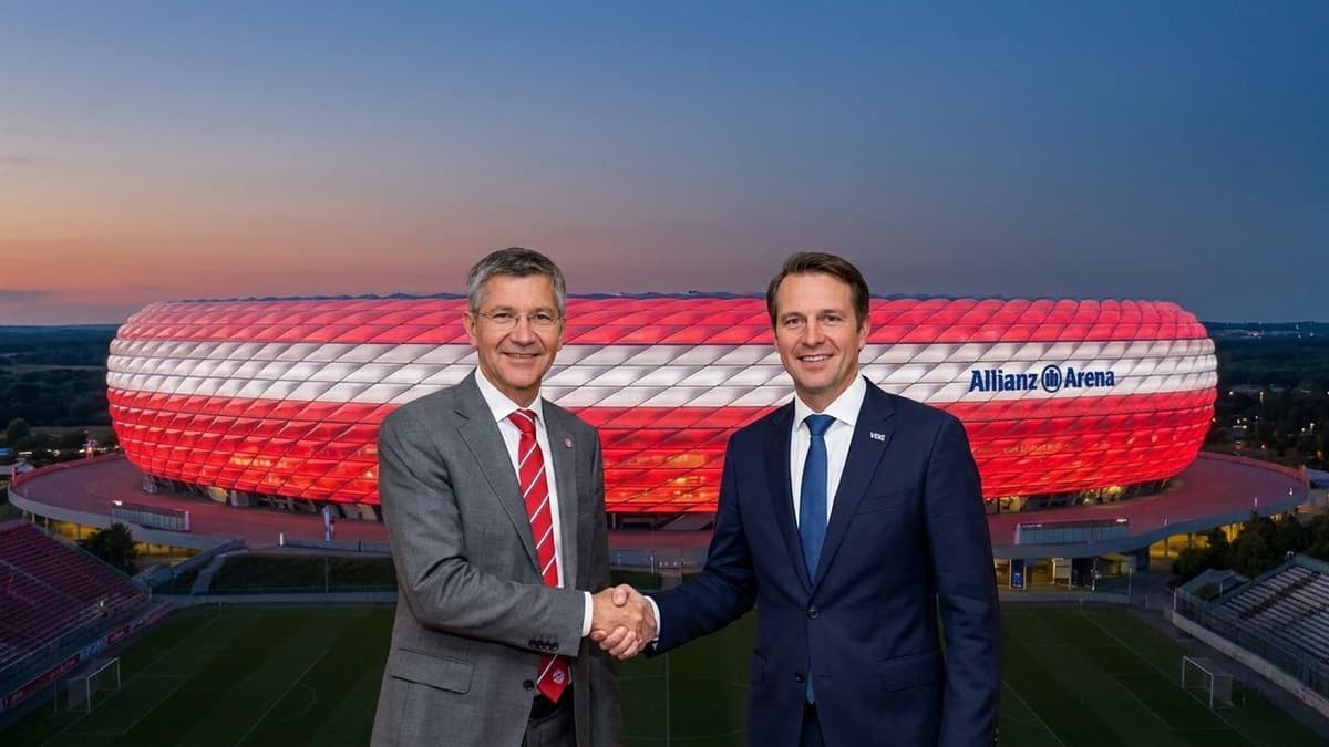 Herbert Hainer, presidente del Bayern Múnich, y Max Viessmann, CEO de VGG, se estrechan la mano frente al Allianz Arena iluminado de rojo y blanco.
