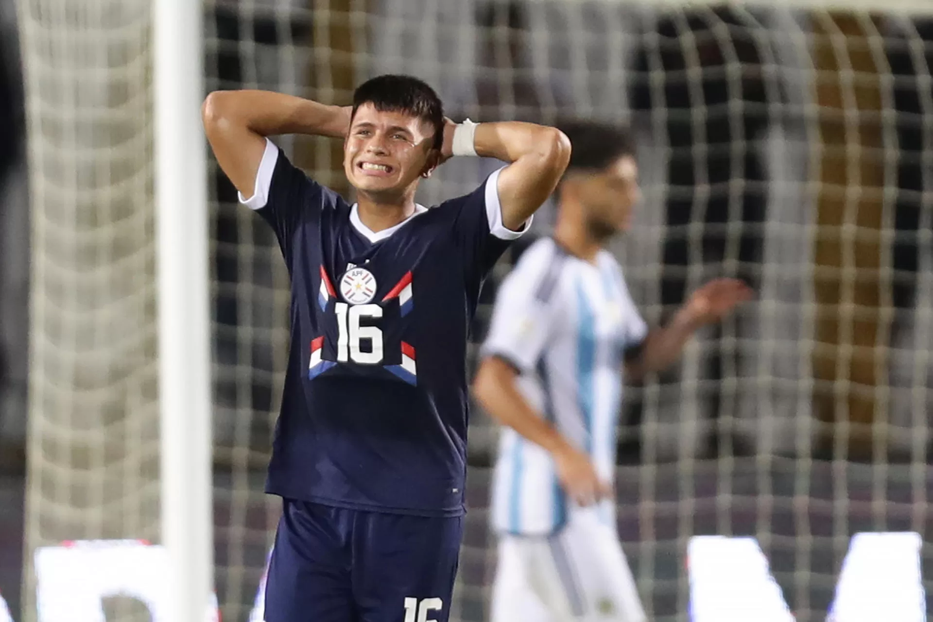 Juan José Cardozo de Paraguay reacciona al final ante Argentina hoy, en un partido del Torneo Preolímpico Sudamericano Sub-23 en el estadio Polideportivo Misael Delgado en Valencia (Venezuela). EFE/ Rayner Peña R. 