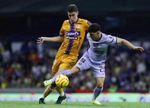 alt El chileno Valdés y el uruguayo Rodríguez le dan triunfo al campeón América sobre San Luis