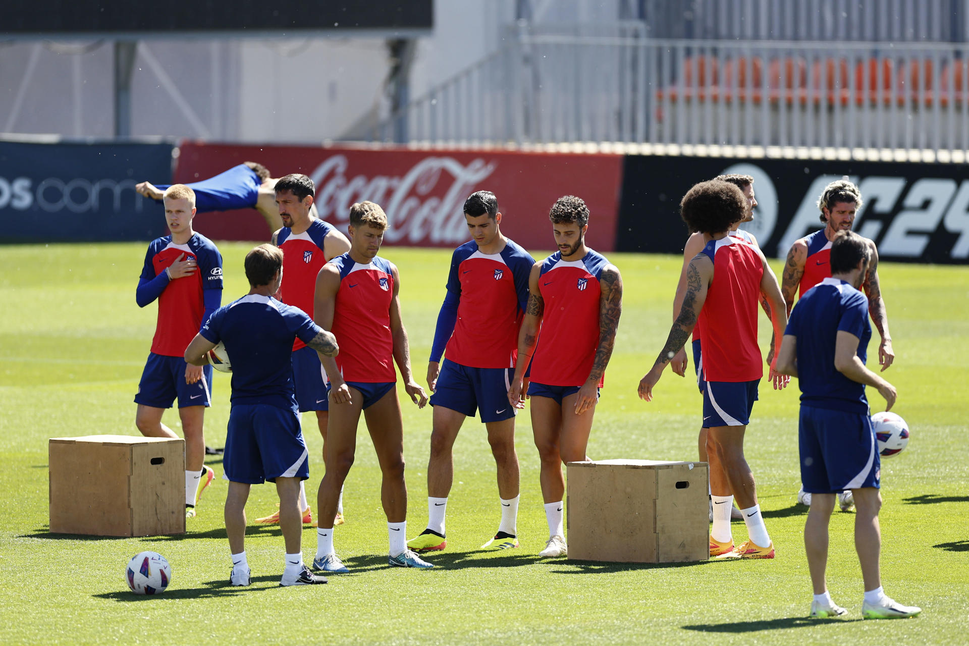 Los jugadores del Atlético, durante el entrenamiento de este sábado.-EFE/ Rodrigo Jiménez 