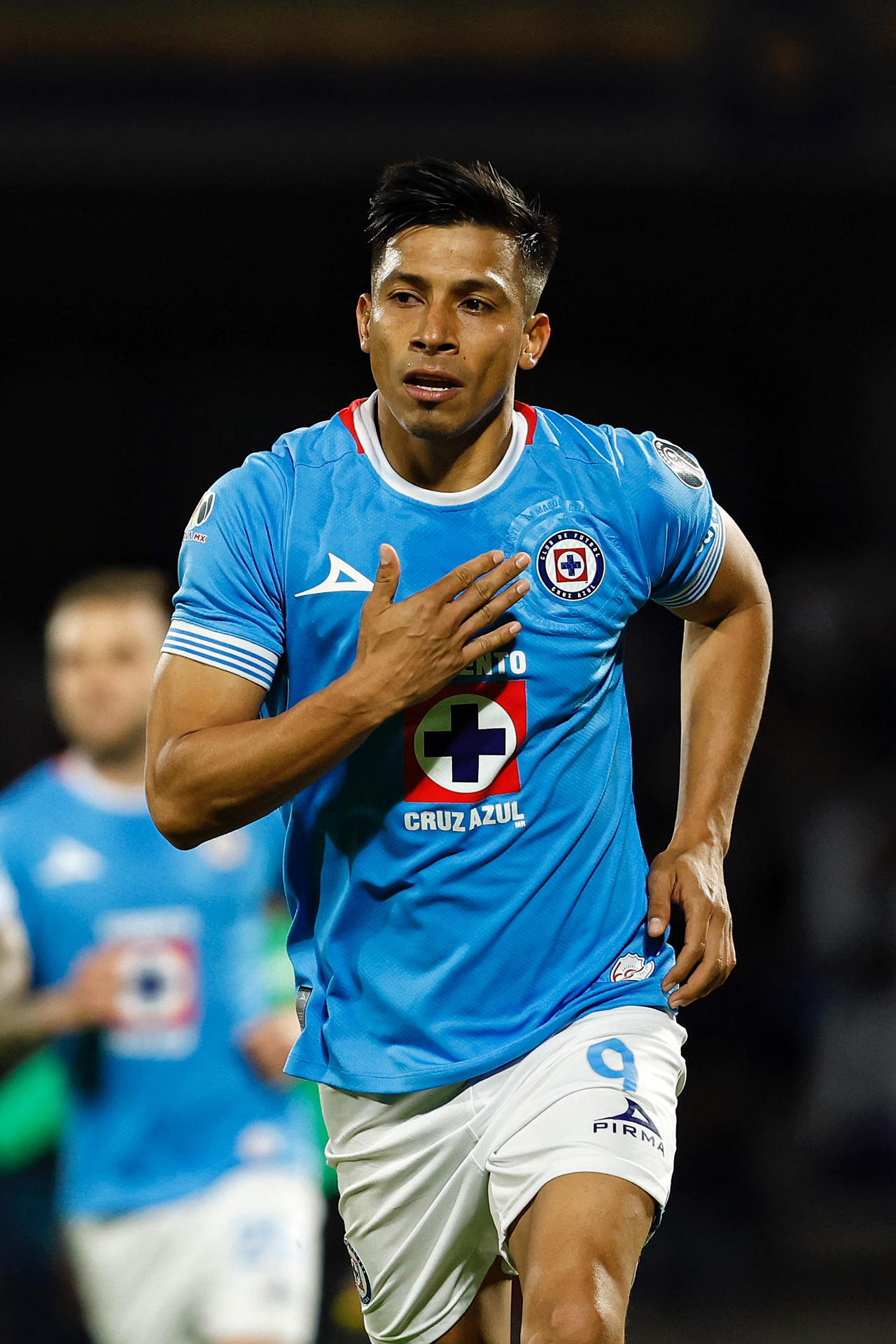 Angel Sepúlveda de Cruz Azul celebra un gol ante Atlas. EFE/ Sáshenka Gutiérrez 