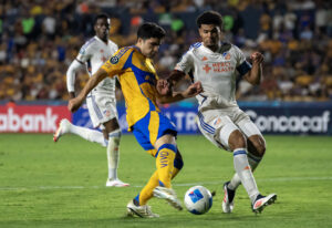 alt Los Tigres vienen de atrás y vencen al Cincinnati para avanzar a los cuartos