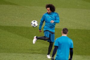 Fotografía de Ian Langsdon, en la que puede verse en una imagen de archivo del 5 de marzo de 2018 al entonces futbolista del Real Madrid Marcelo Viera. EFE