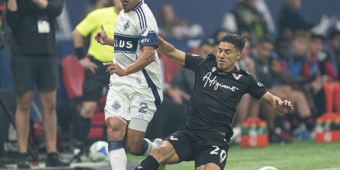 VANCOUVER, CANADA - OCTOBER 1: Nicolás Mezquida #20 of Vancouver FC tries to take the ball away from Mathias Laborda #2 of the Vancouver Whitecaps during the first half of the 2025 TELUS Canadian Championship Final at BC Place on October 1, 2025 in Vancouver, Canada.   Rich Lam/Getty Images/AFP (Photo by Rich Lam / GETTY IMAGES NORTH AMERICA / Getty Images via AFP)
