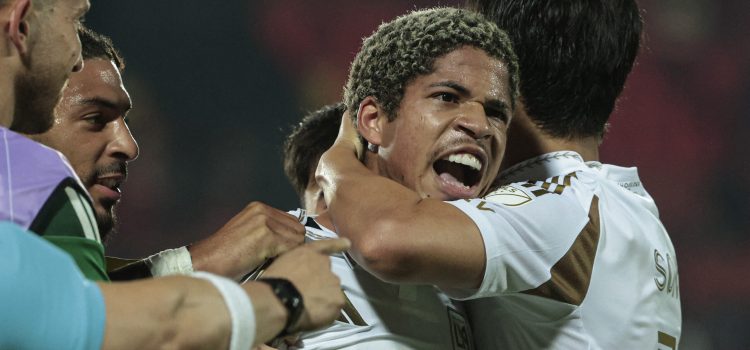Los Angeles FC's Venezuelan forward #30 David Martinez (C) celebrates with teammates after scoring his team's second goal during the CONCACAF Central American Cup round of 16 second leg football match between Costa Rica's Alajuelense and US' Los Angeles FC at the Alejandro Morera Soto Stadium in Alajuela, Costa Rica on March 17, 2026. (Photo by JOHN DURAN / AFP)