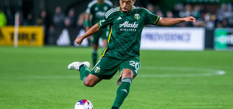 Portland Timbers midfielder Evander (#20) with a shot on goal during an MLS match against St. Louis City SC at Providence Park in Portland, Oregon on Saturday, March 11, 2023.
