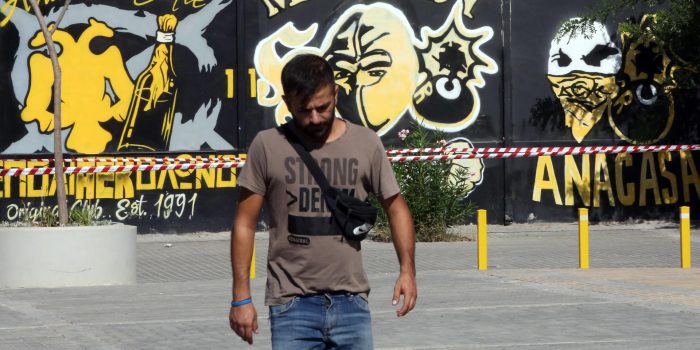 Athens (Greece), 08/08/2023.- A man walks at the spot where a 29-year-old EFE/EPA/ORESTIS PANAGIOTOU